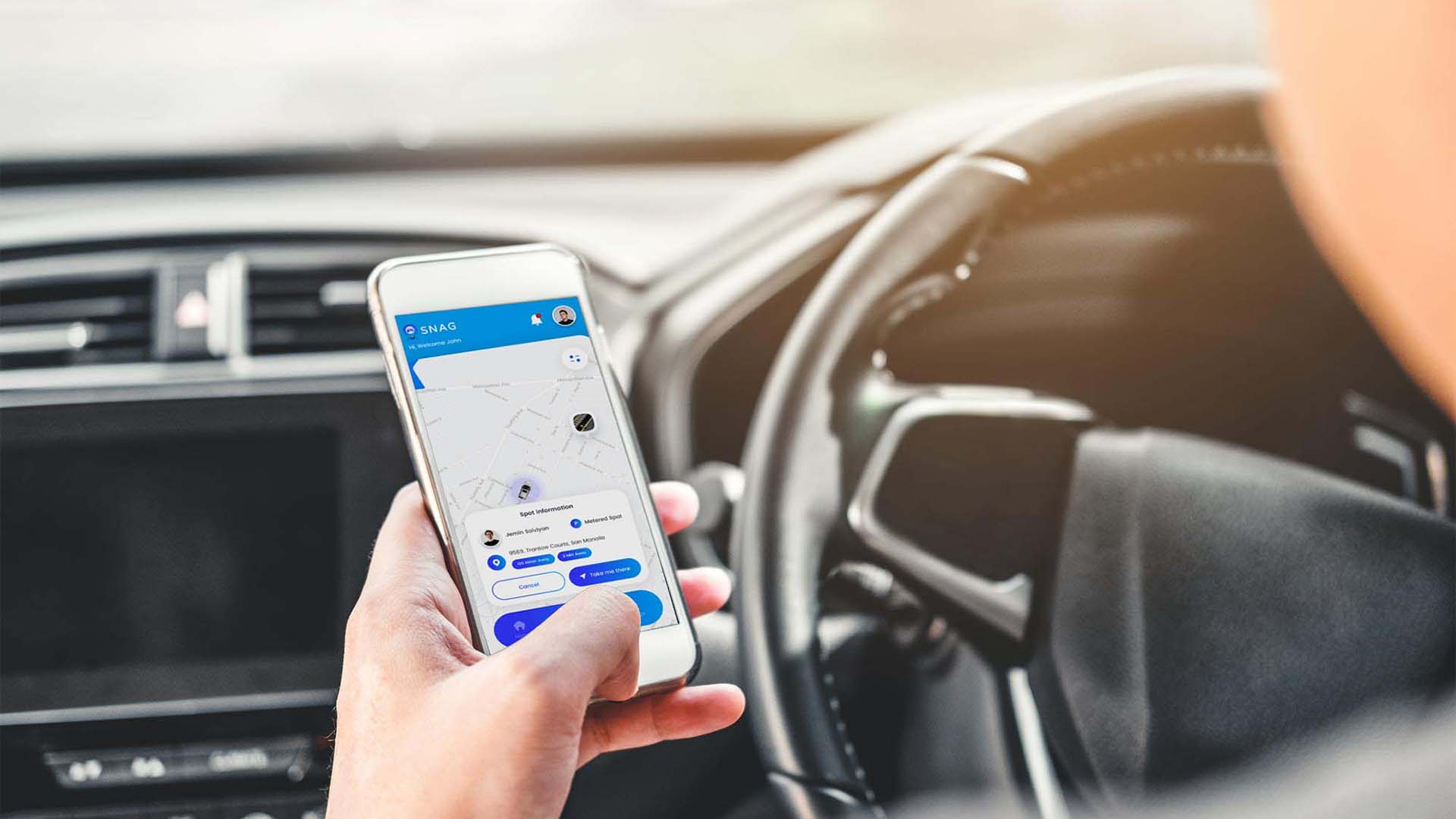 A New Yorker using the SNAG Parking app NYC on their phone to find a street parking spot in Manhattan – best parking app NYC and street parking app.